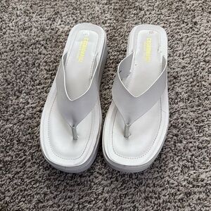 White platform sandals